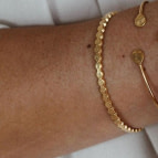 Joobee : bracelet jonc ouvert Pastilles de Léone porté