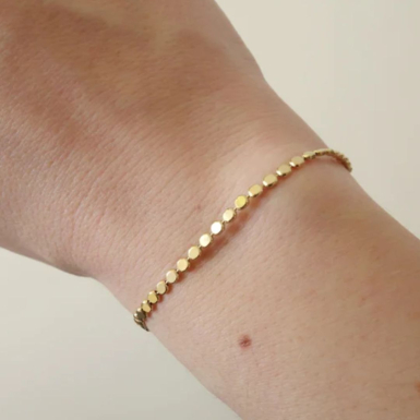 joobee bracelet doré à l'or fin de Sissi 100Fils porté